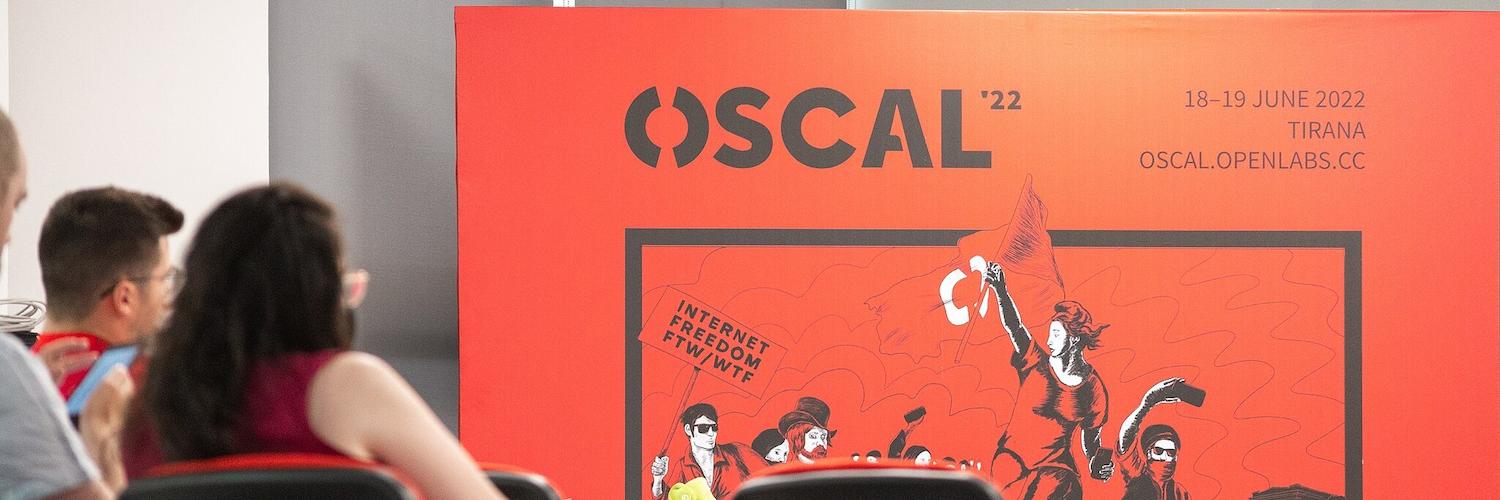 OSCAL 2022 banner in the stage during last edition